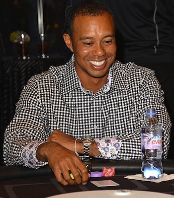 Tiger Woods playing poker. Image courtesy of The Sun.